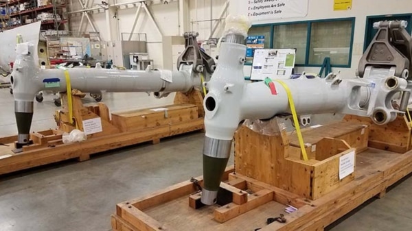 Boeing's Seattle aircraft repair station with composite machines, paint booth, and services for flight controls, nacelles, and structural parts