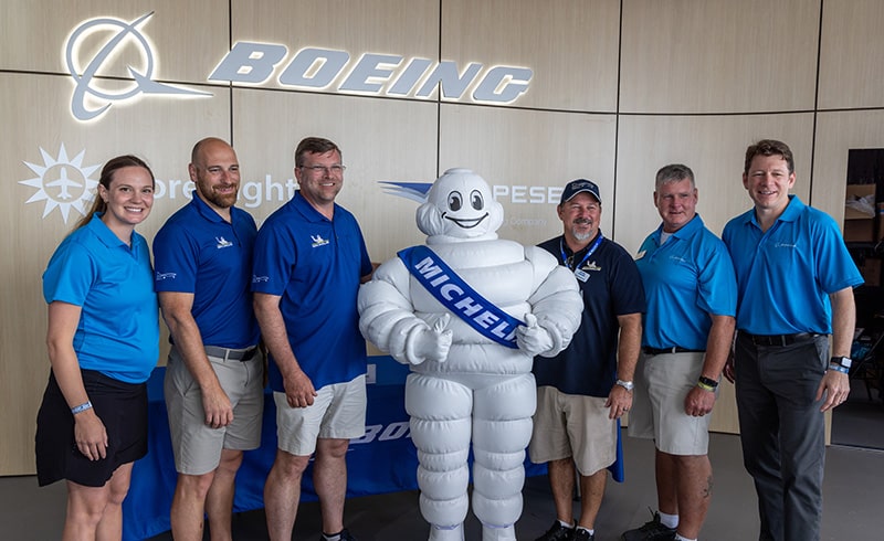 Boeing and Michelin team at the parts agreement signing ceremony at EAA AirVenture 2023